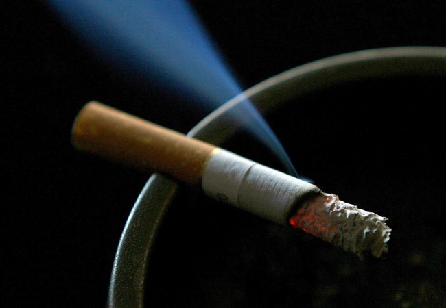 Embargoed to 0001 Monday December 10.
File photo dated 14/06/2007 of a cigarette burning on an ashtray as smoking when pregnant can triple the risk of a child succumbing to a major cause of meningitis, research has shown. PRESS ASSOCIATION Photo. Issue date: Monday December 10, 2012. Inhaling tobacco smoke in the home also made young children vulnerable to invasive meningococcal infection. In the case of those under the age of five, passive smoking more than doubled the risk, a study found. Scientists estimated that each year exposure to second-hand smoke led to several hundred extra children being affected by invasive meningococcal disease in the UK. Meningococcal bacteria are responsible for the most dangerous form of meningitis and can also invade the blood, lungs or joints. One in 20 of those struck by invasive meningococcal disease will die despite medical attention and one in six will be left severely disabled. Several studies have suggested a link between passive smoking and meningococcal disease. See PA story HEALTH Smoke. Photo credit should read: Gareth Fuller/PA Wire